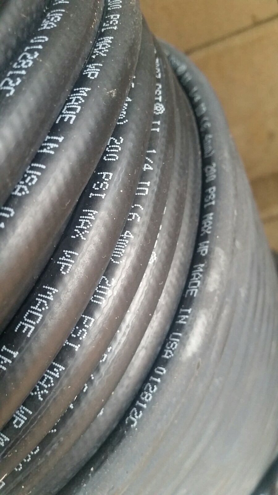 Parker 1/4″ ID Hose (6.4mm) Series 7093 GST II. 200 psi max. 25 foot length. T1